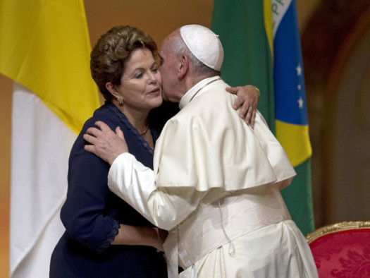 Pope Francis and Brazil's president Dilma Rouseff embrace during the opening ceremony of World Youth Day. (Google Images)