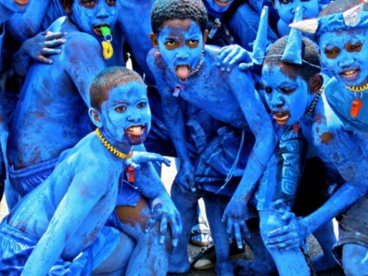 Jouvert celebrations take place throughout the world. Children pose for a picture during Trinidad's Jouvert celebration. (Photo Credit: Google Images)