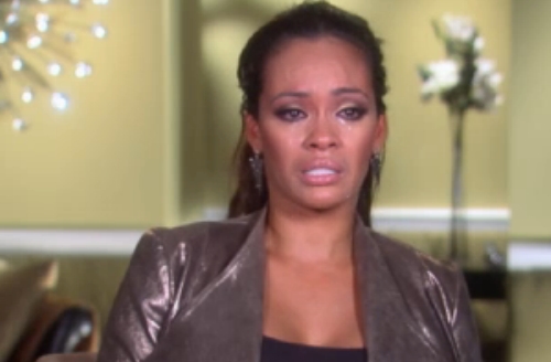 Basketball Wives Evelyn Lozado weeps as she discusses her domestic violence incident with ex-husband and former NFL star Chad Johnson. (Photo Credit: Screen grab from VH1)