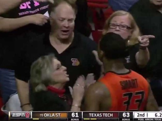 Oklahoma State player Marcus Smart is verbally abused by Texas Tech fans before shoving Jeff Orr. (Photo Credit: ESPN screen grab)