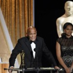 Honoree singer and social activist Harry Belafonte speaks after receiving the Oscar statuette for the Jean Hersholt Humanitarian Award, at the Academy of Motion Picture Arts and Sciences Governors Awards in Los Angeles