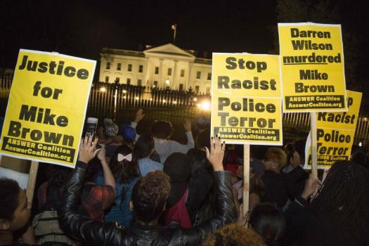 Protesters gather in front of the White House to protest the Ferguson grand jury's decision not to indict Officer Darren Wilson in the killing of unarmed teen Michael Brown, 18. 