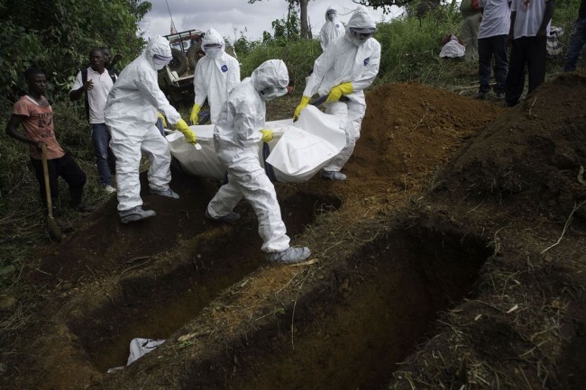 Ebola victims are buried in mass graves in Sierra Leone. (Photo: National Geographic)